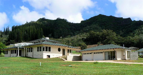 The Liddle/Valentin house is tucked below the mauka (inland) side the the Sleeping giant. Looming above is the 'head' and 'chest' of the giant. Note the strong focus by the windows on the corners of the house.