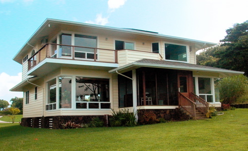 View of the Brown House from the back yard. Note the echoing mitered glass corners on the first and second floors.