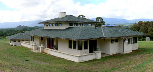 The roof form of the Liddle/Valentin house appears deceptively simple. Note the large skylight on the roof peak of the on the right side of this image. This brings natural light into the interior of the Master Bedroom Suite.